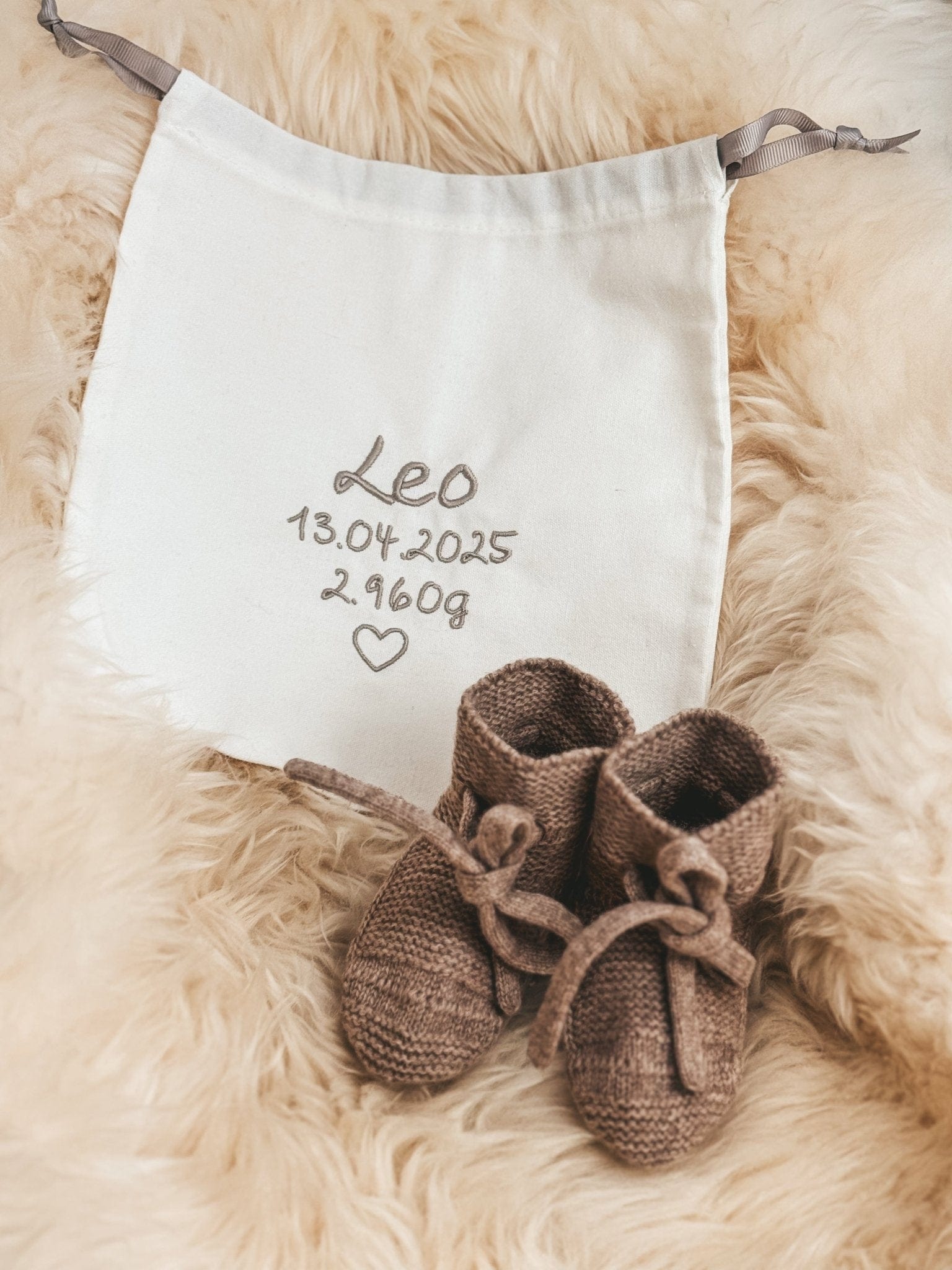 Merinowolle Babyschuhe mit personalisierter Tasche