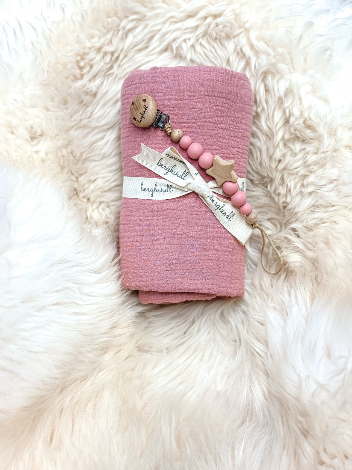 Geschenk Geburt in rose Tönen