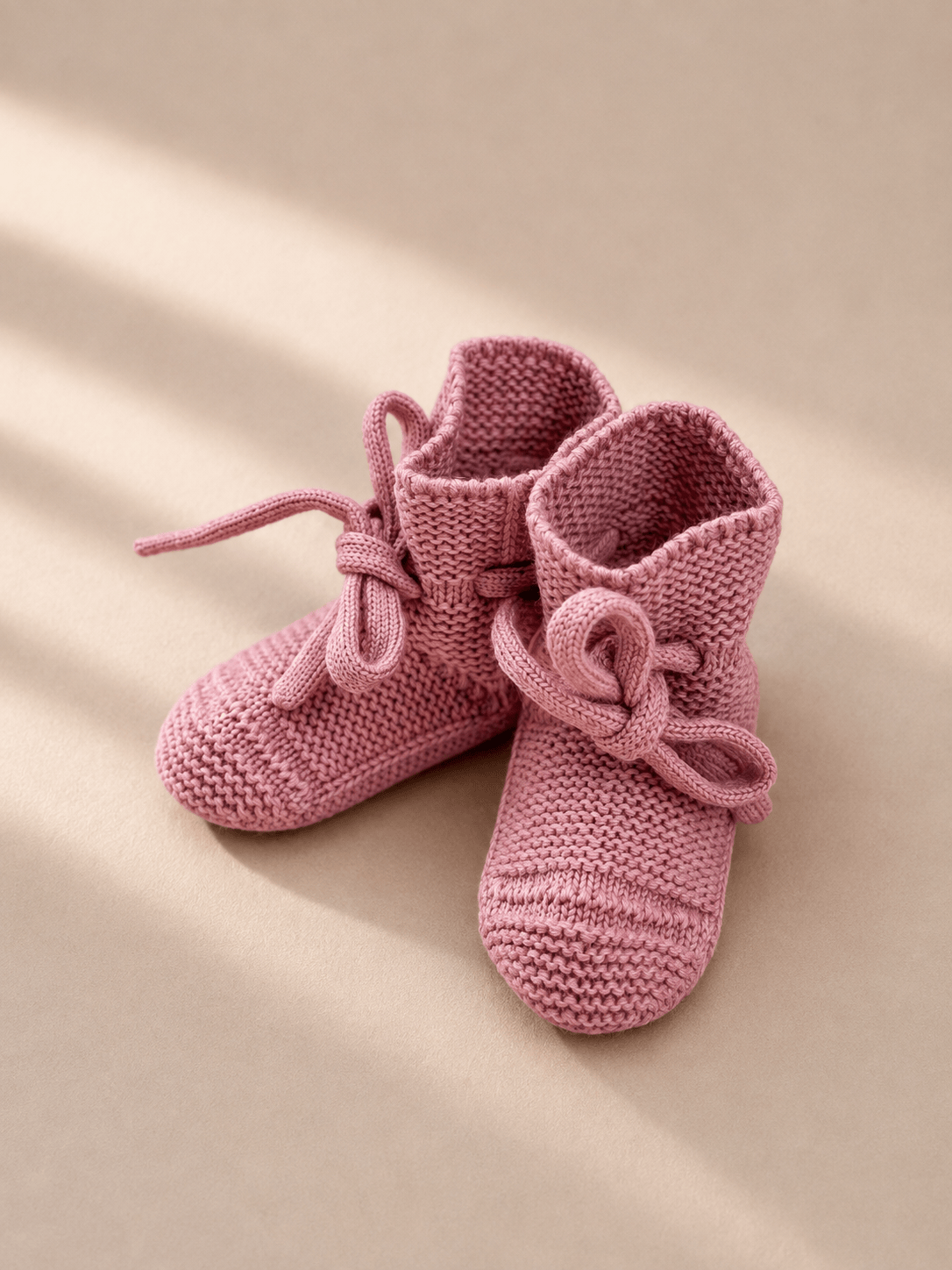  Babyschuhe in rose – bergkindl Merinowolle