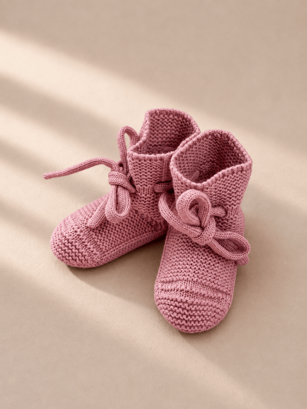  Babyschuhe in rose – bergkindl Merinowolle