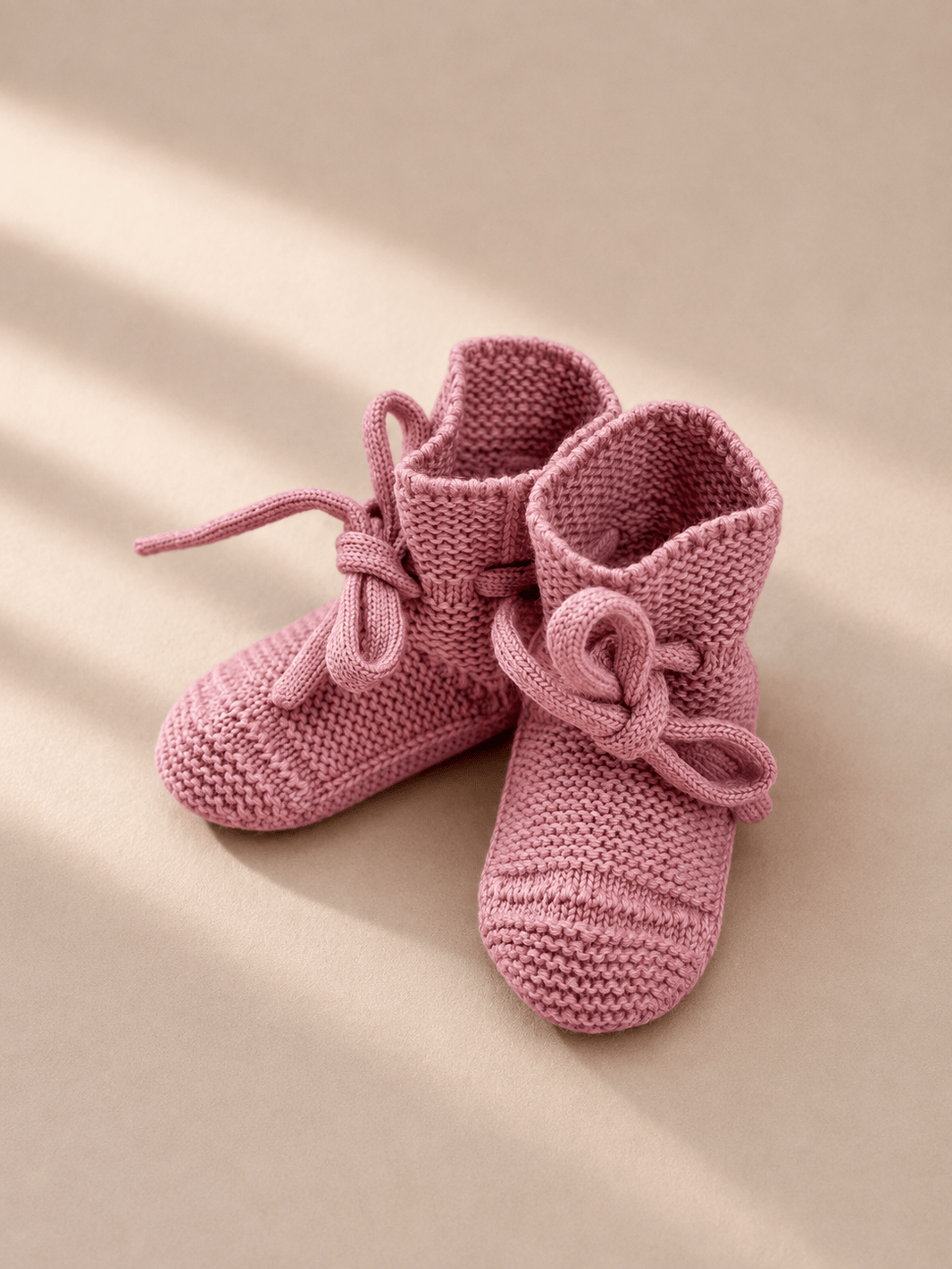  Babyschuhe in rose – bergkindl Merinowolle
