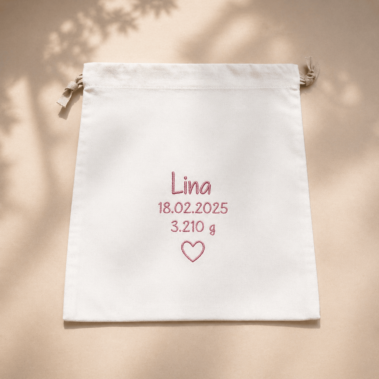  Babyschuhe in rose – bergkindl- Tasche personalisiert
