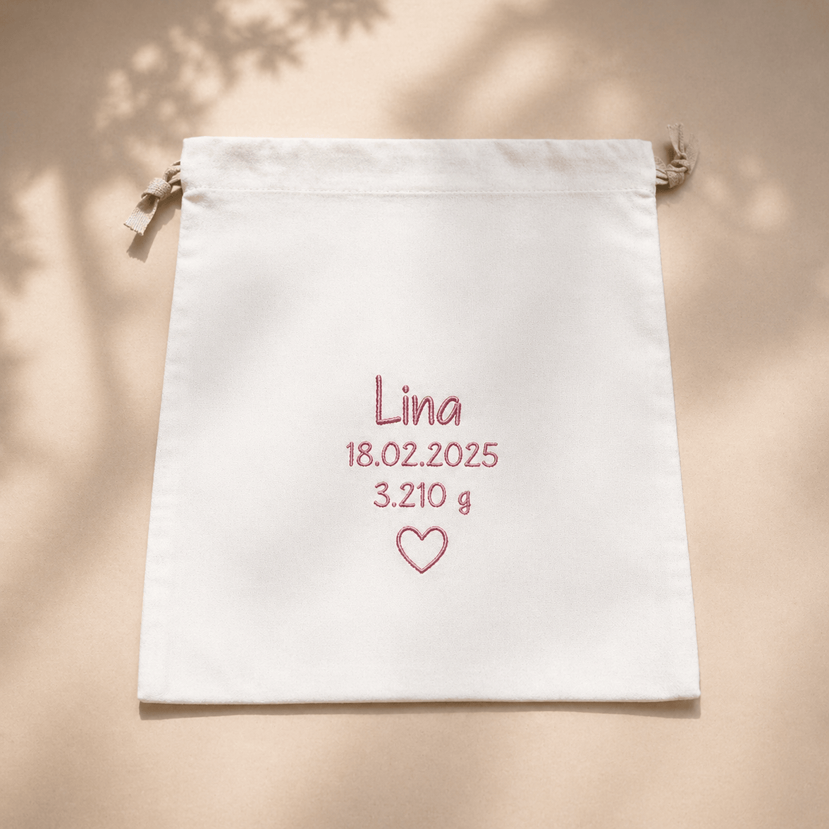  Babyschuhe in rose – bergkindl- Tasche personalisiert